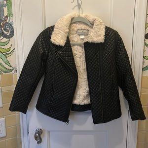 Girls fur lined, faux leather quilted jacket.